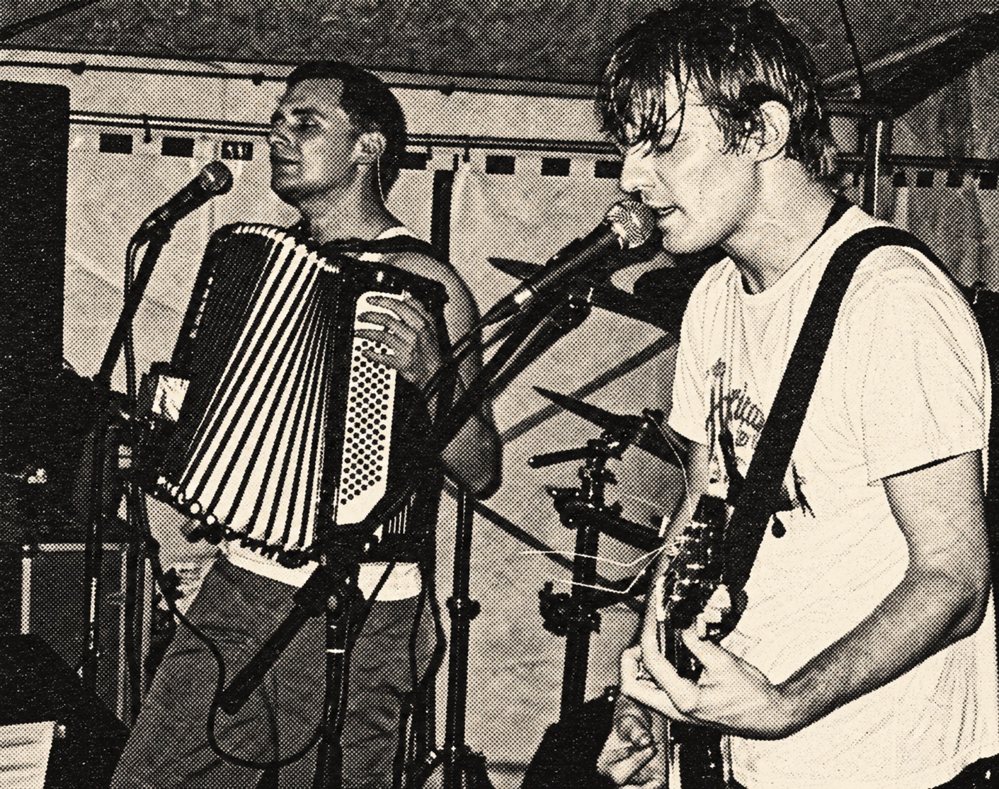 Hans Stübinger on accordion alongside the singer — black-and-white halftone